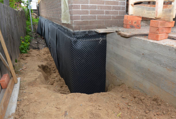 Happy homeowners after waterproofing job in Silver Spring